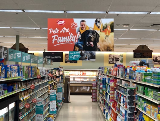 Pets Are Family signage in aisle