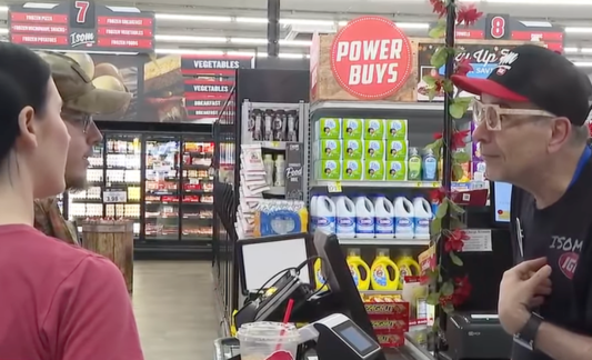 Father Jim Sichko at Cash register