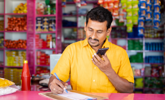 grocer answering phone 533